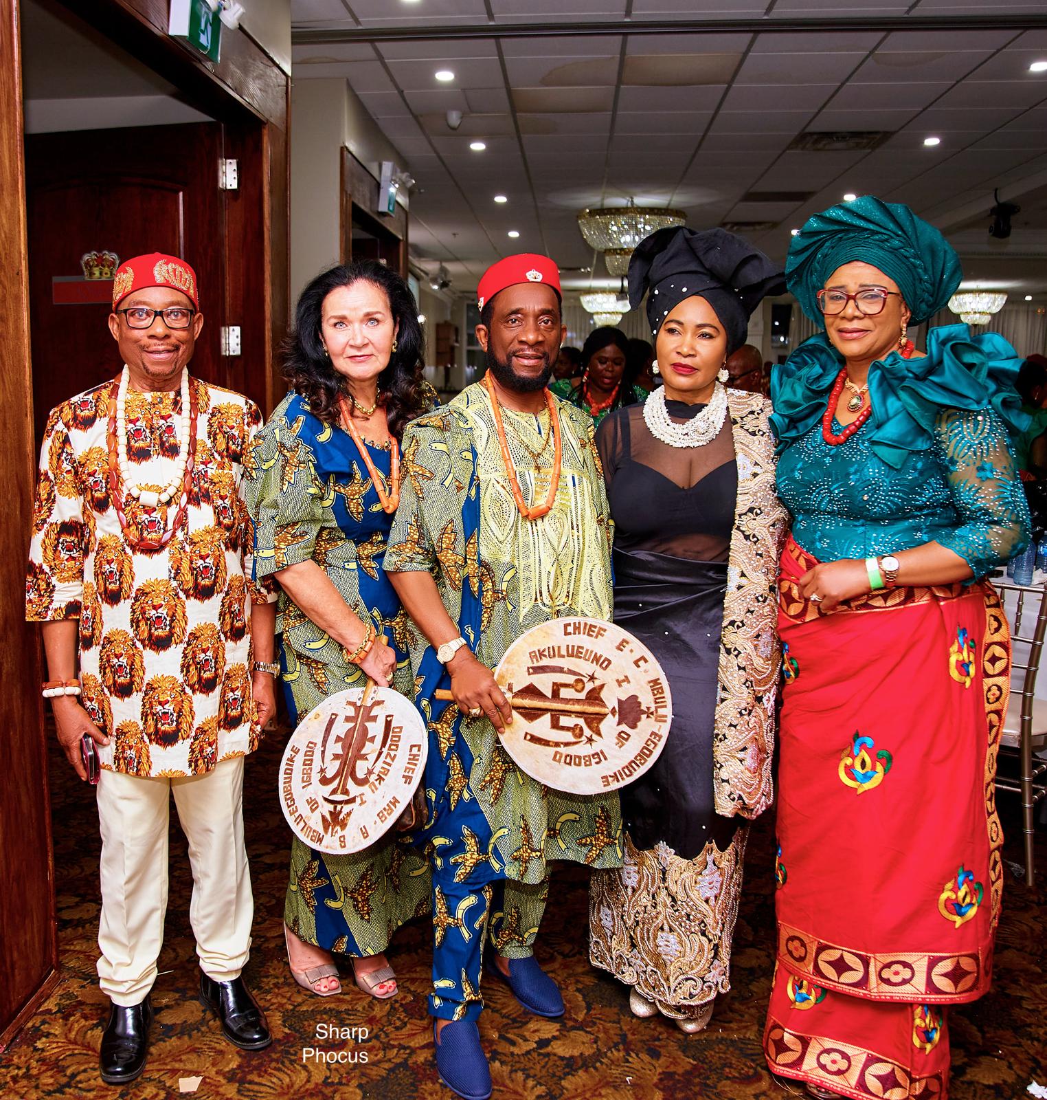 A render of three white cylindrical columns, against a warm creme background
